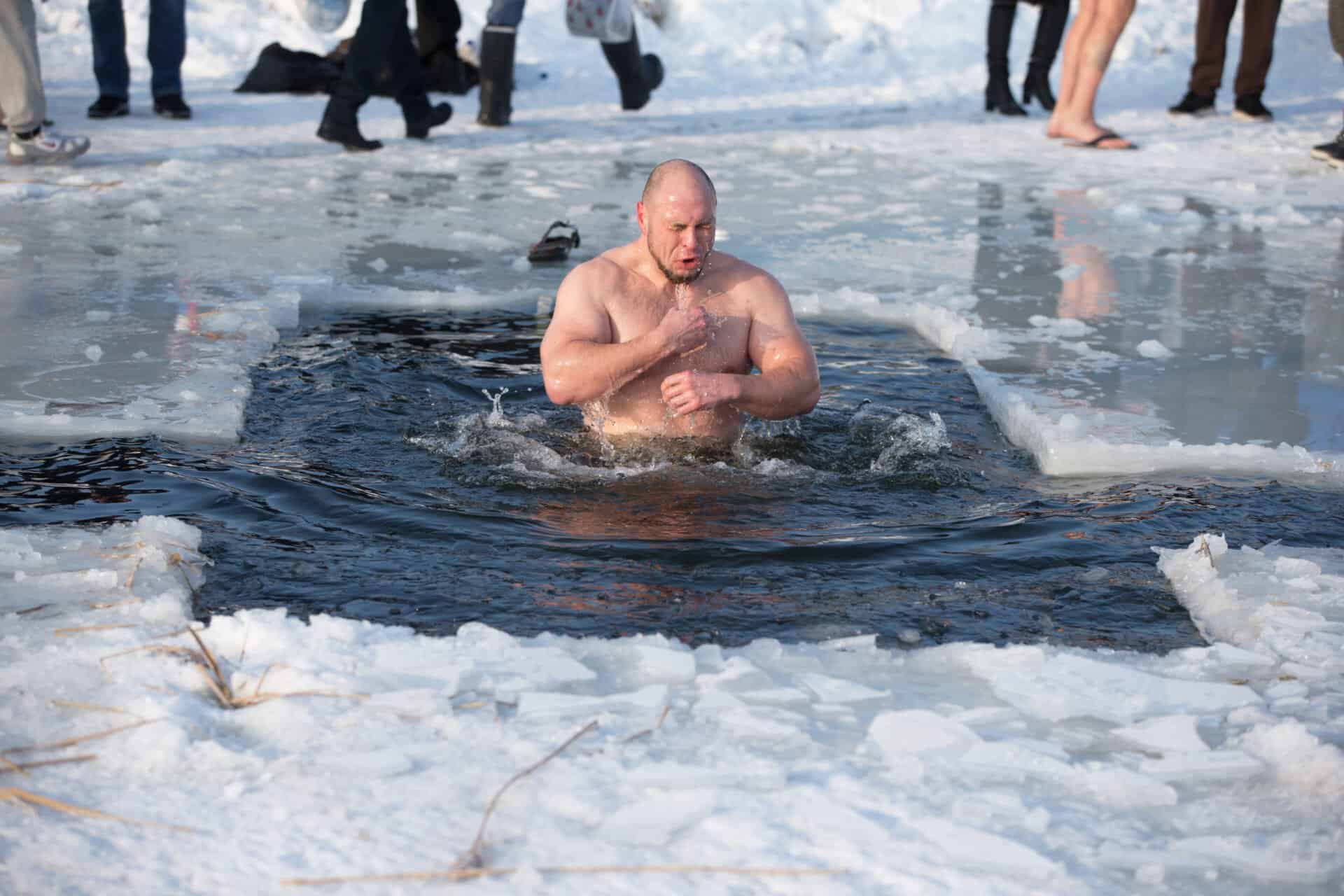 Bathing In The Ice Hole. Plunge Into The Ice Water
